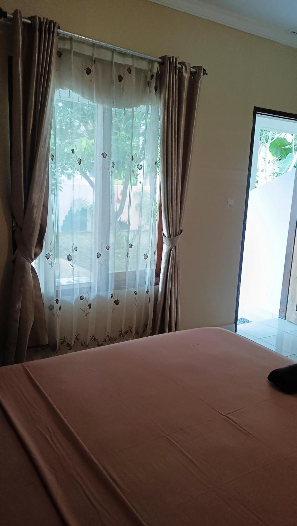 Tiga Spies Hostel Kuta  Kültér fotó